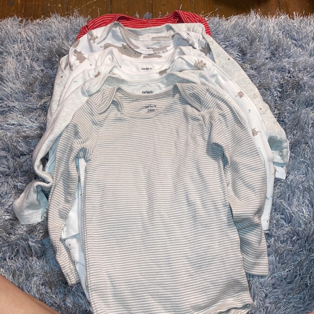 Set of 7 Carter’s onesies